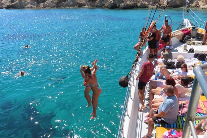3 Island Cruise Tour in Kos Island with Personalized Audio Guide - Plati Island: your swim and cliff-jump break in turquoise water