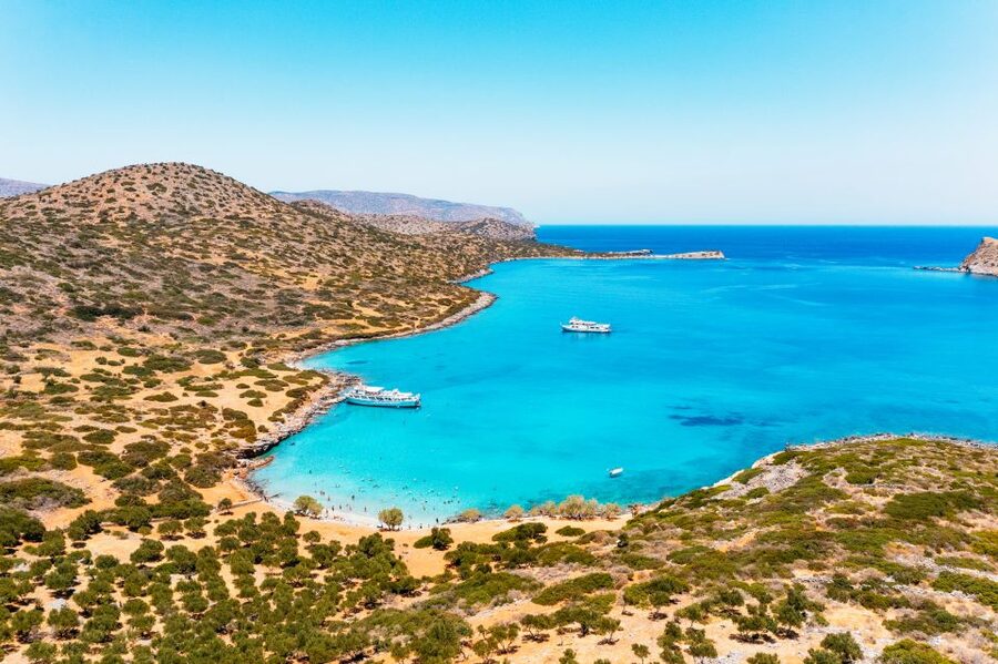 Agios Nikolaos: Boat Trip to Spinalonga with Swim Stop - Mirabello Bay Cruise: Pirate caves, Olous, and Kri Kri goats