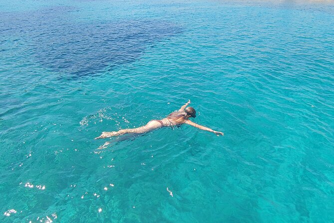 Antiparos & Despotiko Kaiki Cruise — Coves, Swim & BBQ - Crew, boat vibe, and what to watch for during the day