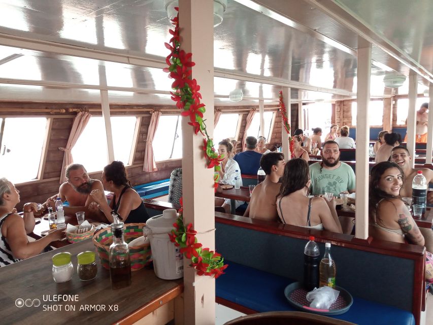 Argostoli: Full-Day Boat Cruise with Lunch - Beach transfers, what might surprise you, and how to prepare