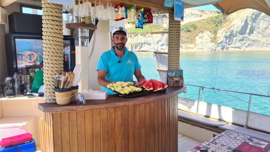 Argostoli: Full-Day Traditional Boat Cruise with Lunch - Xi Beach red clay and the natural spa moment