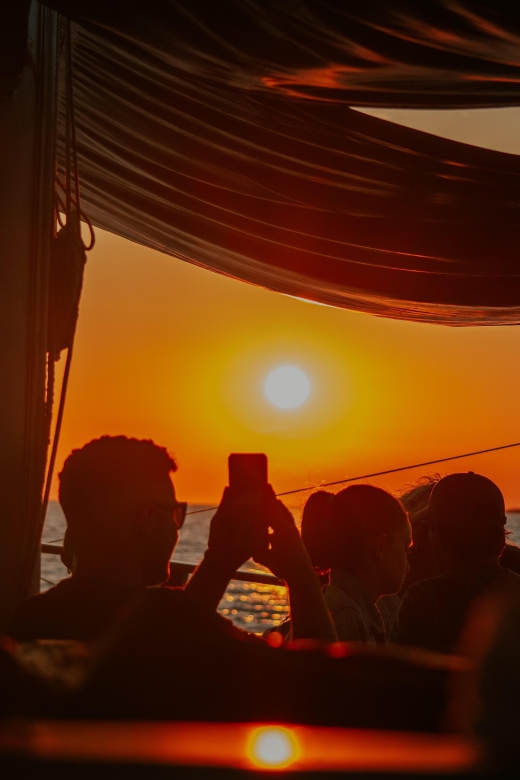 Argostoli: Sunset Cruise with Swim Stops, Dinner, and Wine - Key highlights in plain terms