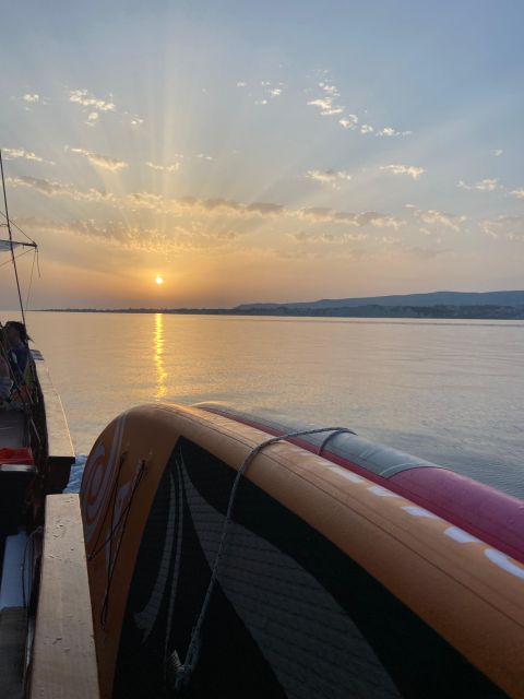 Argostoli: Sunset Cruise with Swim Stops, Dinner, and Wine - Swimming, snorkeling, and paddle boards: what you can actually do in the water