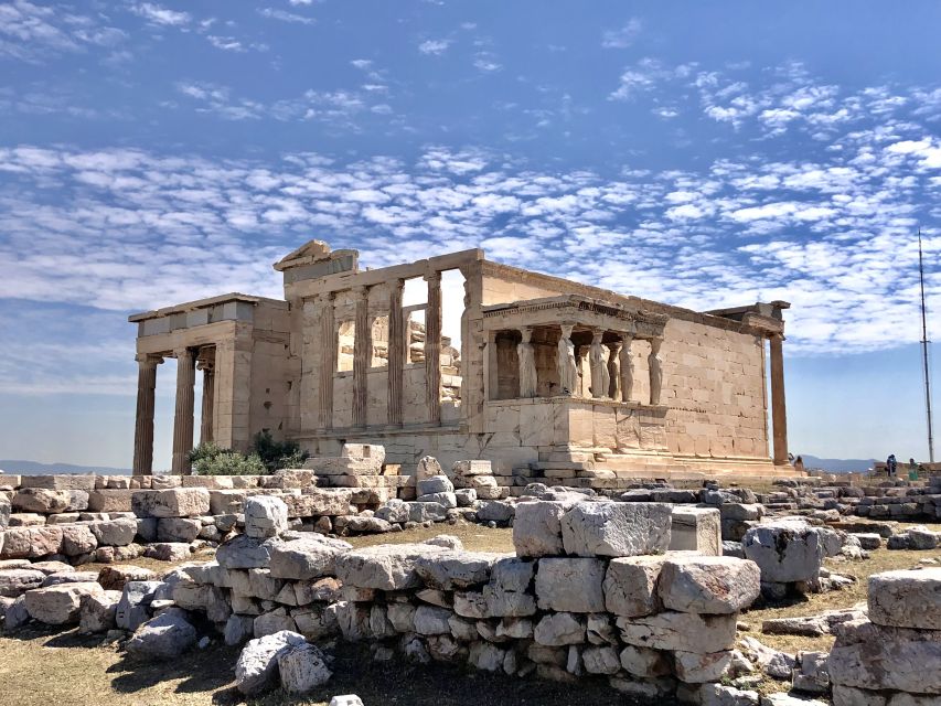 Athens:Acropolis - Historical Center Walking Tour in Spanish - Teatro de Dionisio, Athena vs Poseidon, and the stories behind the stones