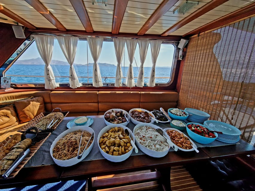 Athens: Agistri, Metopi & Aegina Cruise with Meals & Drinks - Lunch on the Yacht: Greek Buffet, White Wine, and Beer