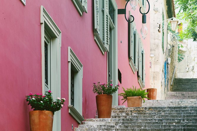 Athens: Ancient Corinth & Nafplio Full Day Trip with Swim - Arvanitia Beach Swim Time: Summer Fun With Rocky Footing