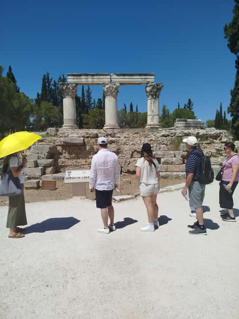 Athens: Ancient Corinth Tour with Official Guide & Tickets - Ancient Corinth Agora: where merchants, empires, and daily life meet