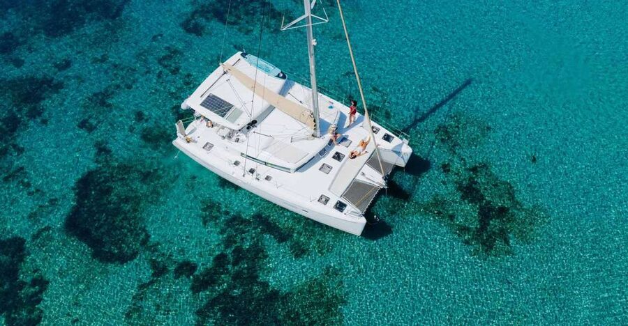 Athens: Catamaran Cruise with Fresh Lunch and Wine - Vouliagmeni Bay: cosmopolitan coast, another chance to swim