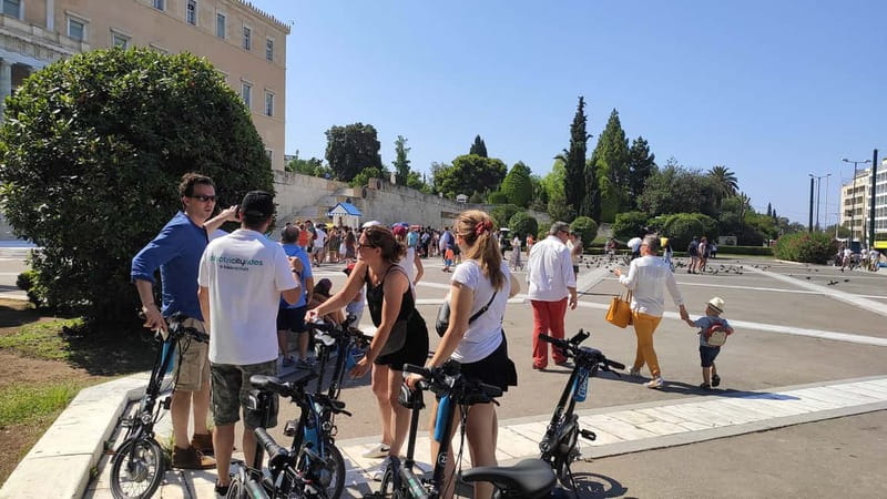 Athens: Discover the City Electric Bike Tour - Meeting point, guide energy, and how the ride actually starts