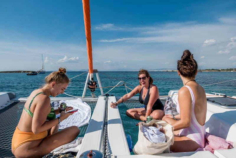 Athens: Half-Day Morning Catamaran Cruise with Meal & Drinks - Swim and snorkel stops: crystal water, quick check-ins, and wind reality
