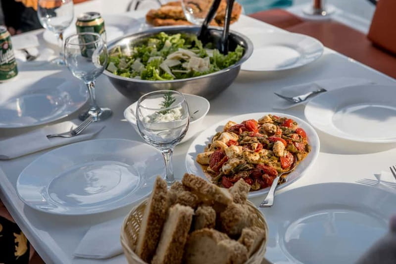Athens: Half-Day Morning Catamaran Cruise with Meal & Drinks - Lunch onboard: seafood pasta, salads, appetizers, and real Greek warmth
