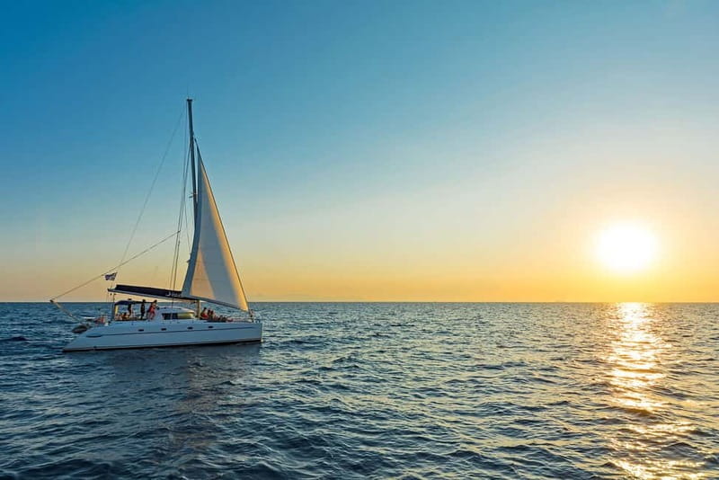 Athens: Half-Day Sunset Catamaran Cruise with Meal & Drinks - Sunset viewing from deck, and why timing can shift