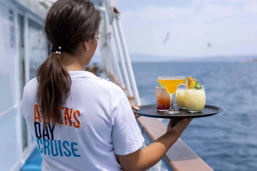 Athens: Islands Swimming Day Cruise. DJ, Lunch & Drinks inc. - Aegina Port and Pistachios, Plus the Temple of Aphaia Views