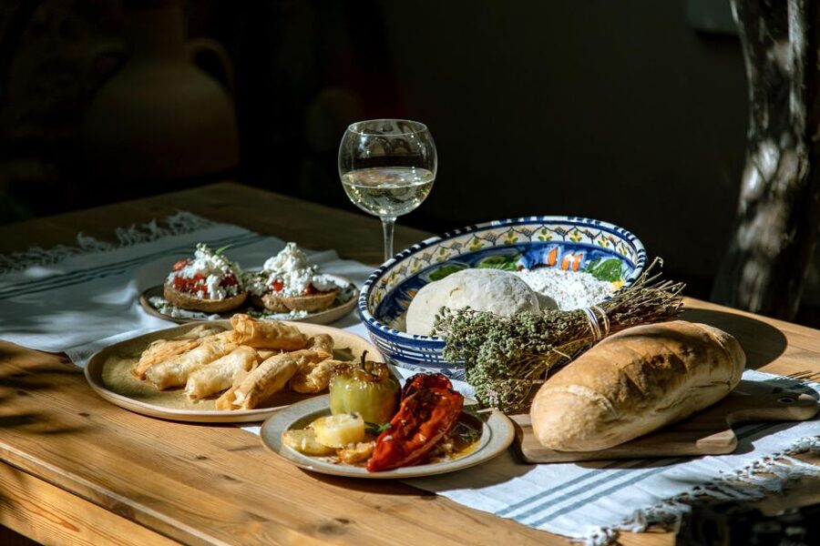 Athens: Kerameikos Stone House Cooking Class - Garden Courtyard, Wine Pairing, and the Stories Part