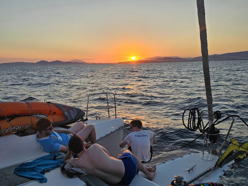 Athens: Riviera Catamaran Tour with Fresh Meal and Drinks - What you actually get: included gear, drinks, and essentials to bring