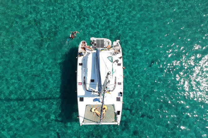 Best of Milos and Poliegos Catamaran snorkelling Cruise with BBQ - Starting in Adamantas: The Golden Hour Set-Up for Milos