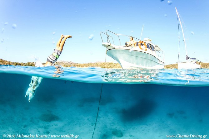 Boat Trip in Crete with Guided Snorkeling and Free Pick up! - Akrotiri Peninsula cruise, swim stops, and the Blue Cave glow