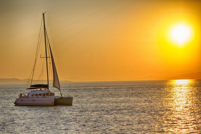 Catamaran Day & Sunset Cruises with meals Drinks and transportation - Drinks and Lunch: Homemade Rose Wine, Greek Food, and What You Should Bring