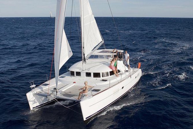 Catamaran Day & Sunset Cruises with meals Drinks and transportation - Rhenia Anchor Stop: 2 Hours to Swim, Snorkel, and Eat in the Water