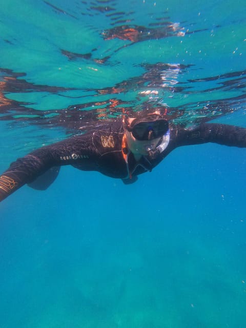 Chania: Boat Trip with Guided Snorkeling Tour - First Snorkeling Spot: A Guided 45 Minutes That Teaches You The Rhythm