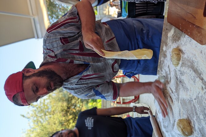 Chania Cooking Class-The Authentic Enjoy traditional Cretan meal - Kalitsounia workshop: rolling pins, dough, and sweet reward