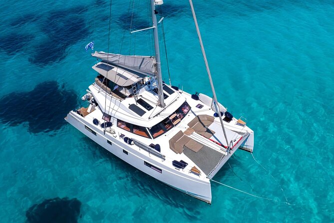 Chania: Morning Catamaran Cruise with Premium Lunch & Drinks - Anchored Water Time With SUP, Snorkeling Gear, and Inflatables