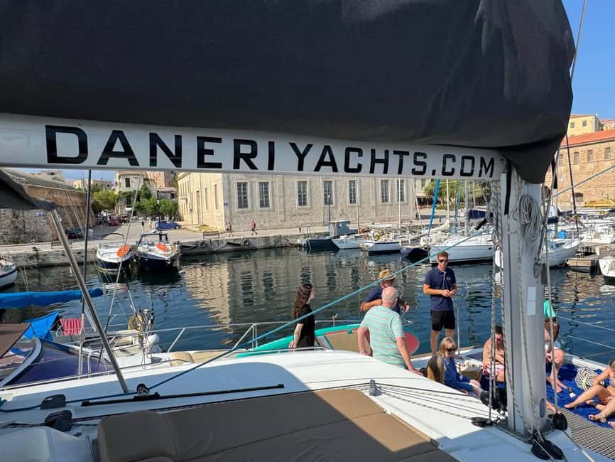 Chania Old Port: All-inclusive Catamaran Trip Agioi Theodori - Entering Chania’s Old Port routine, then switching to sea-mode