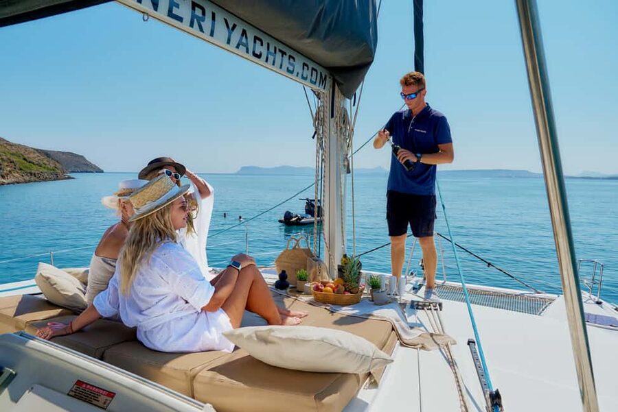 Chania Old Port: All-inclusive Catamaran Trip Agioi Theodori - The catamaran feel: modern comfort, deck space, and shade you will use