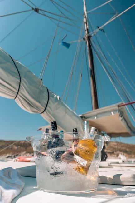 Corfu: Blue Lagoon and Cave Cruise with Drinks and Lunch - Meeting ODYSEIA at Benitses Marina, end of Pier E