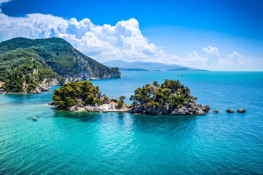 Corfu: Parga, Sivota and Blue Lagoon Full-Day Boat Cruise - Onboard guide energy: history in multiple languages and fun on the return