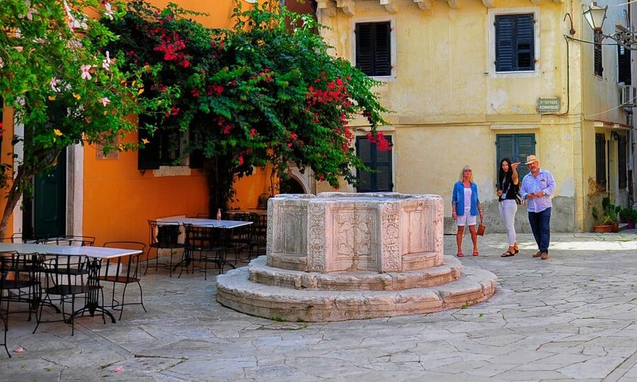 Corfu Town: Guided Walking Tour and Local Food Tastings - Meeting at the Old Fortress statue, then getting your bearings fast