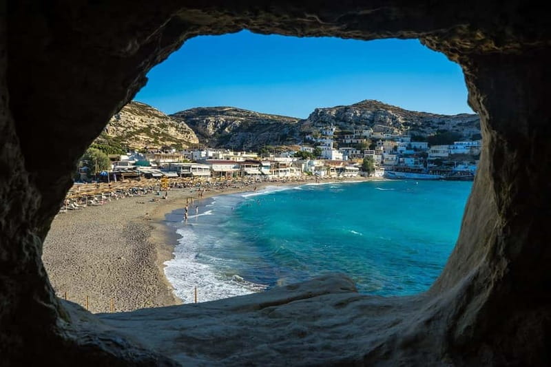 Crete: Beach Day Trip to Matala and Komos - Matala village and cave area, from prehistoric caves to 60s freedom
