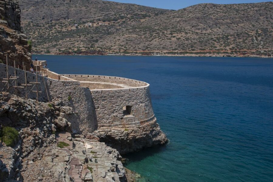 Crete: Spinalonga, Elounda, & Agios Nikolaos Boat Tour & BBQ - Crossing to Spinalonga: Mirabello Bay Views With a Story Attached