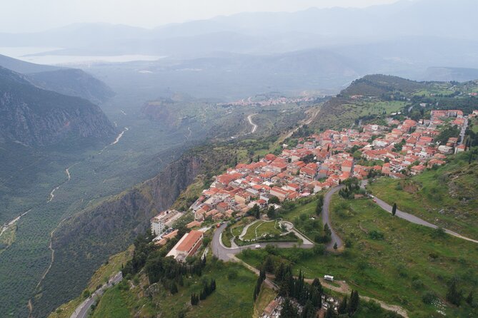 Delphi full day V.R audio guided tour with entry ticket - Arachova stop for mountain views and quick browsing