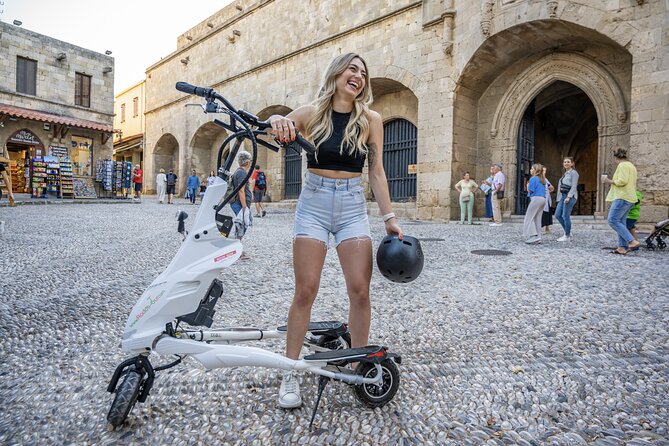 Explore the Medieval city of Rhodes on scooters - 2 hours - Mandraki Harbour: colossus myths and harborside views