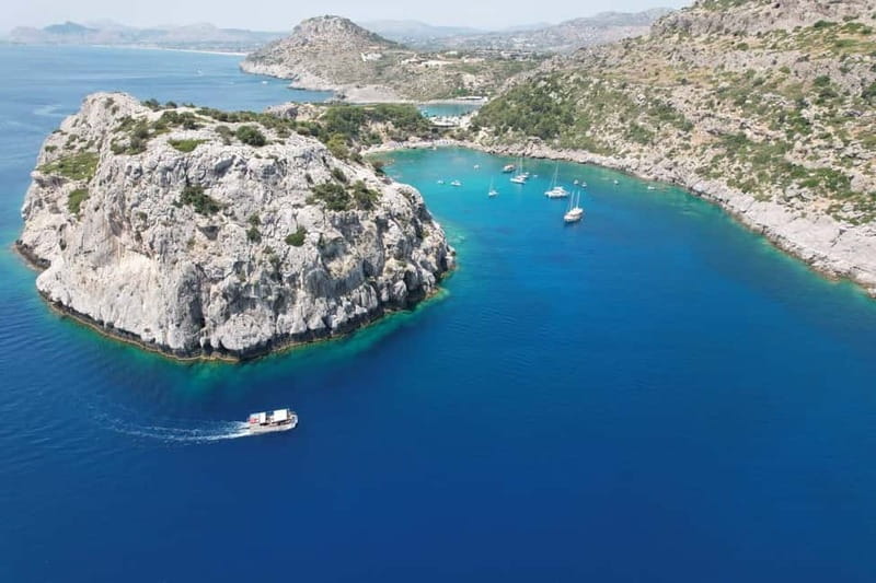 Faliraki: Boat Trip to Afandou Caves, Anthony Quinn & Ladiko - The Open Bar Experience: Cold Drinks, Upbeat Music, and Extra Treats