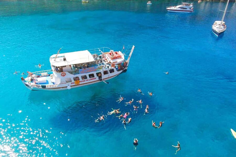 Faliraki: Lindos Boat Cruise with Swim stops & Free Time - Lindos free time (3 hours), town wander plus Acropolis options