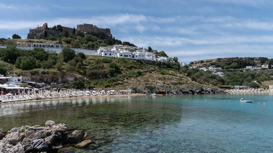Faliraki: Lindos Boat Cruise with Swim stops & Free Time - Onboard comfort, what the AC and toilets do for you