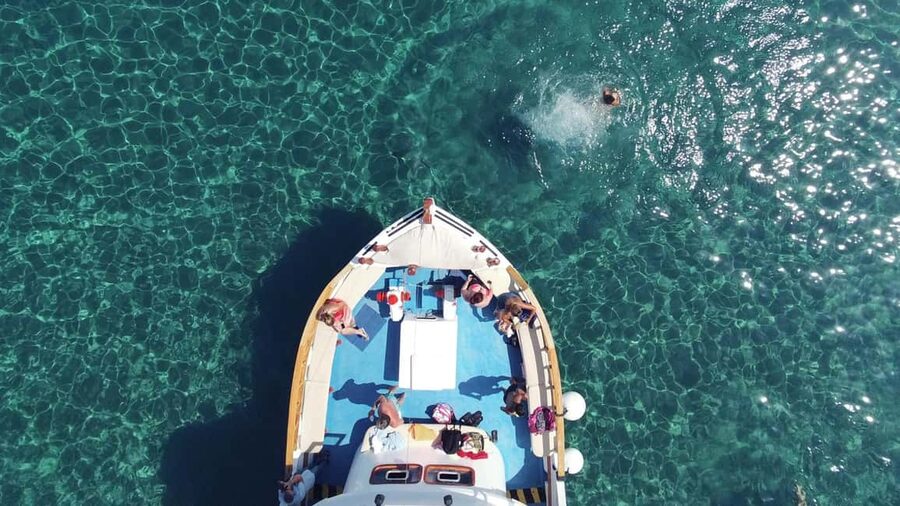 Faliraki: Lindos Boat Cruise with Swim stops & Free Time - What to bring for a smoother day at sea