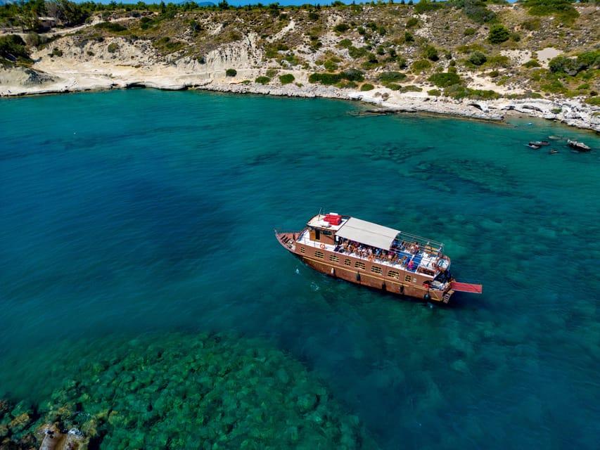 Faliraki : Transfer & Cruise to Lindos with 3 Swimming Stops - The pirate boat cruise: Fun ride, real views
