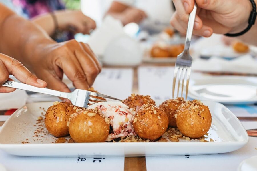 Fira: Guided Foodie Walking Tour with Tastings - From Agios Gerasimos Square to the Blue-Domed Church Photo Stop