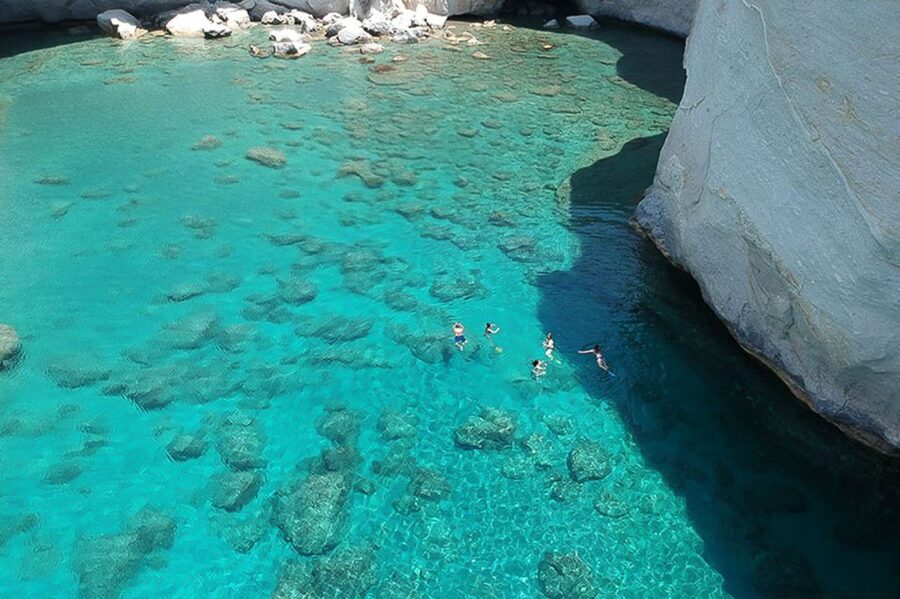 From Adamas: Milos and Poliegos Catamaran Cruise with Lunch - Kleftiko caves: the stop with snorkeling energy and paddleboarding fun