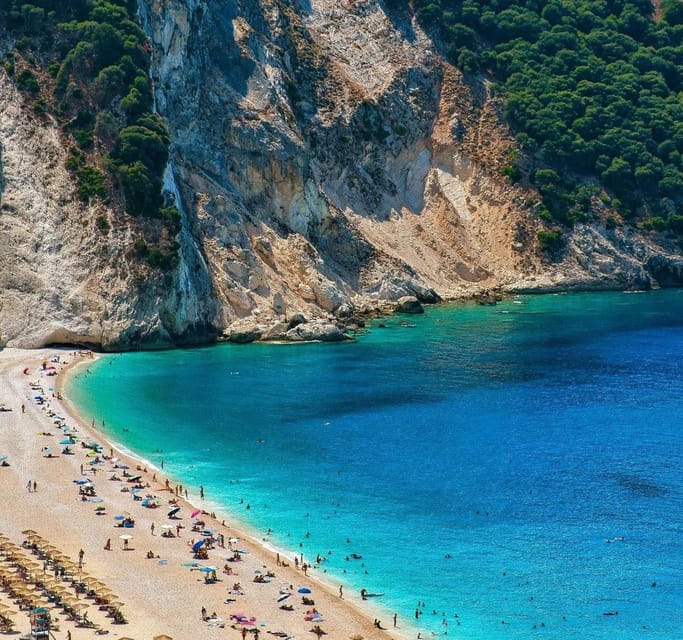 From Argostoli: Melissani Lake and Myrtos Beach Tour - Myrtos Beach: white pebbles, deep water, and shade you can manage