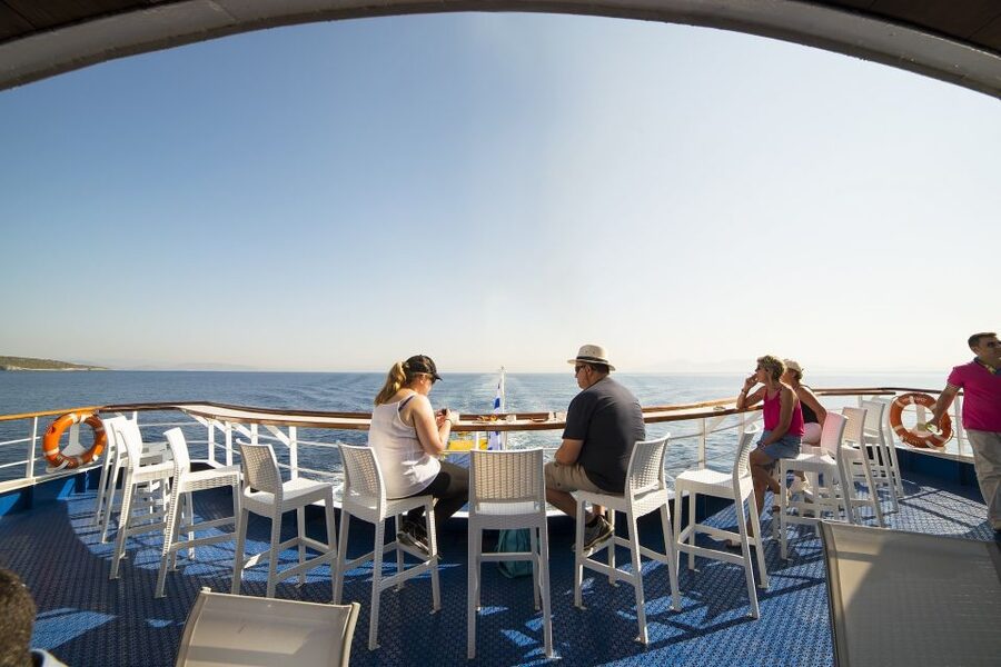 From Athens: Saronic Islands Full-Day Cruise with VIP Seats - Poros in About 50 Minutes: Pines, White Houses, and a Clock Tower