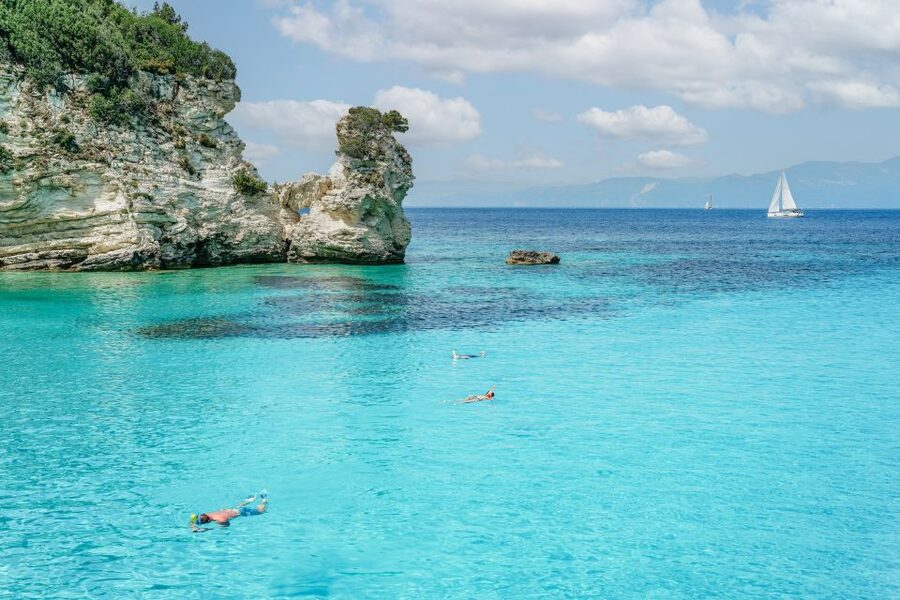 From Corfu Island: Antipaxos & Paxos Blue Caves Boat Cruise - Entering the Blue Caves of Paxos, Photos Plus Narration