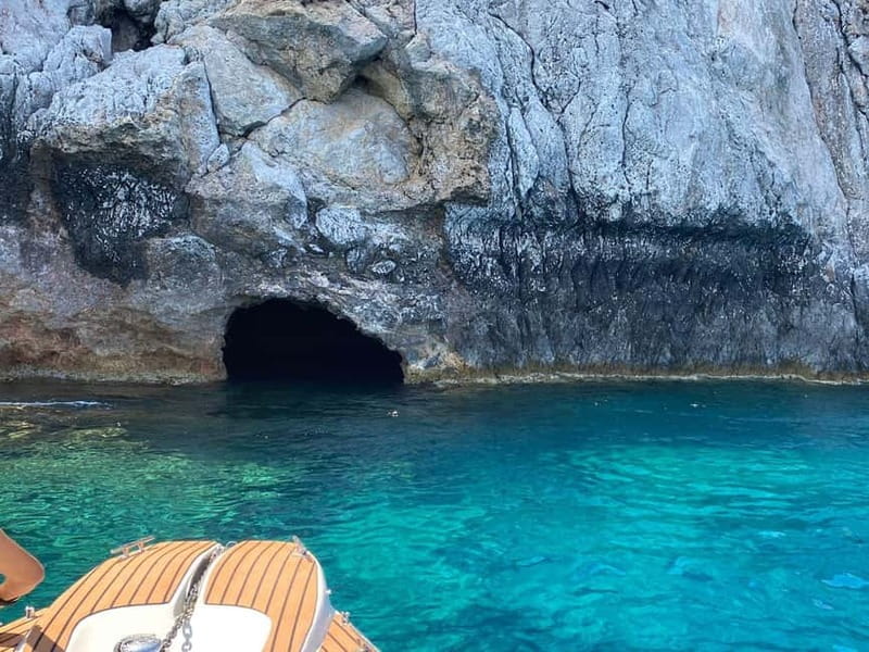 From Faliraki : Speedboat tour kalithea caves&antony kouin - Antony Queen Bay snorkeling: calm water, rocky bottom, and real fish odds