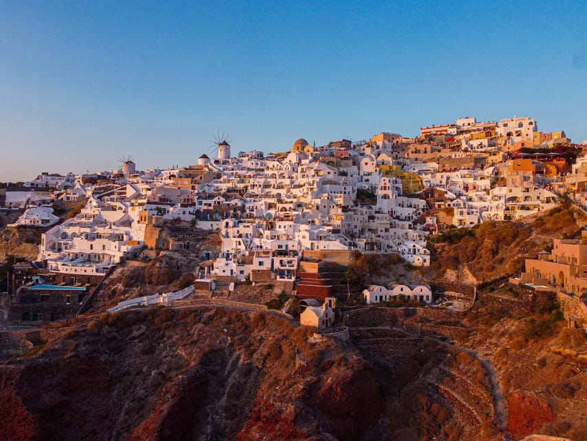 From Fira: Santorini Highlights Minibus Tour with Oia Sunset - Red Beach: Big Color Contrast, Often With Less Time Than You Want