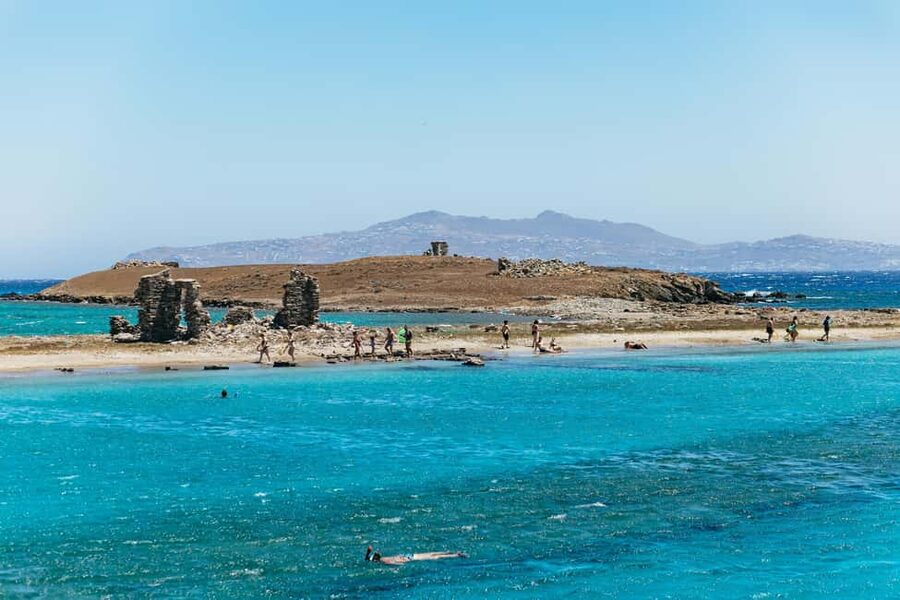 From Mykonos: Cruise to Delos and Rhenia with Lunch - Lunch onboard: BBQ comfort with tzatziki, rice, and steady drinks