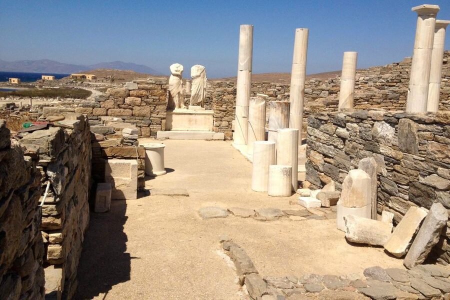 From Mykonos: Delos Archaeological Site Guided Evening Tour - Walking Delos with a guide: streets, sacred zones, and the Theater