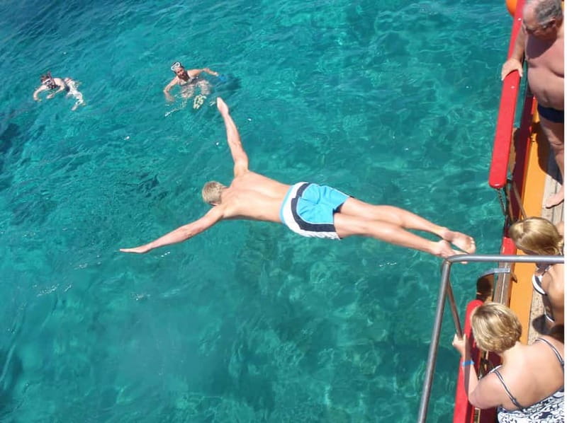 From Naxos: Koufonisia Boat Cruise and Rina's Cave w/ Lunch - Rina’s Cave: swim, step ashore, and jump if you’re feeling brave